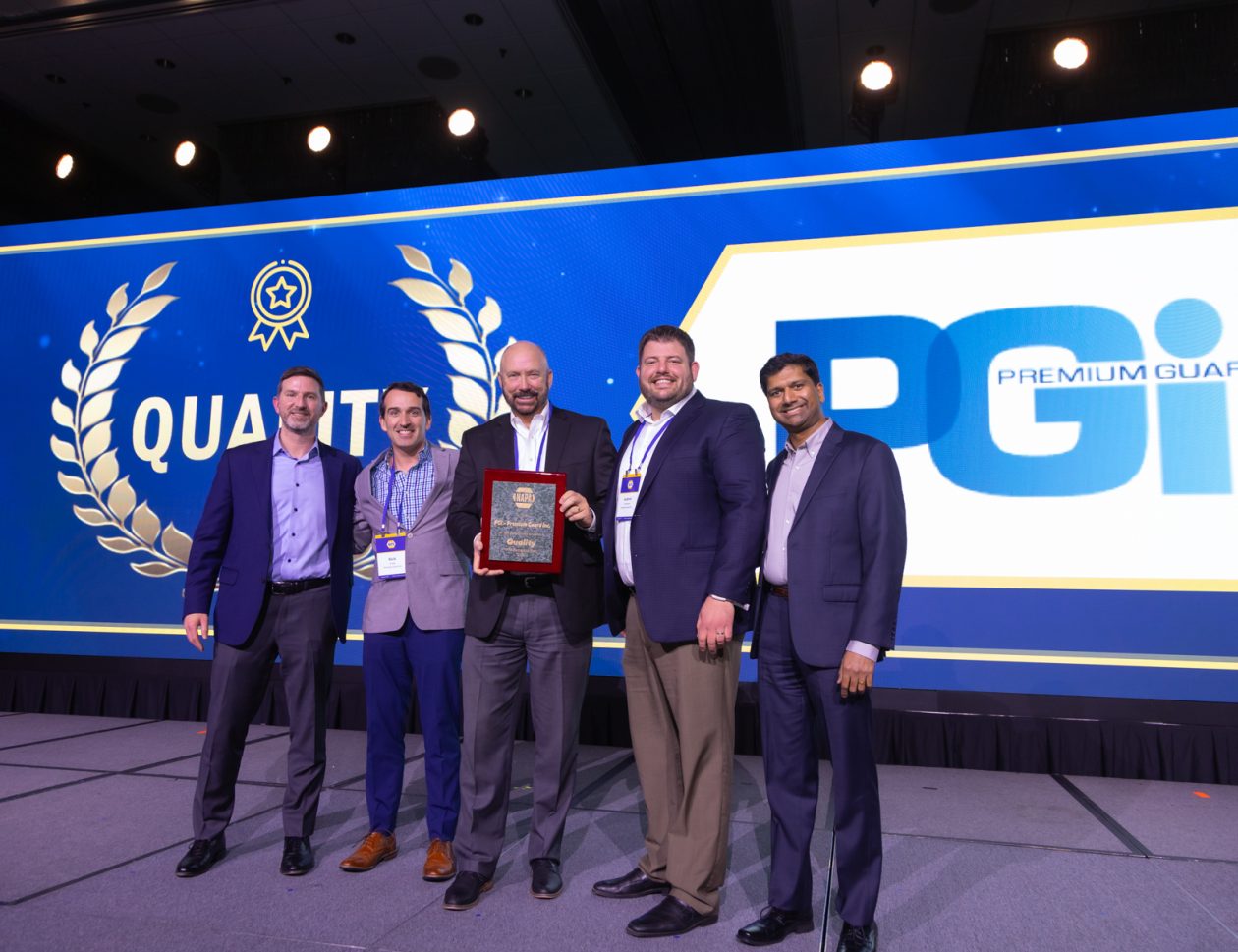 PGI's Ty Nilsson, Rick Jordan, and Andrew Hauenstein accept NAPA's supplier award on PGI's behalf