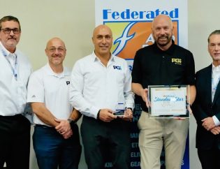 premium guard leadership team accepts fisher award