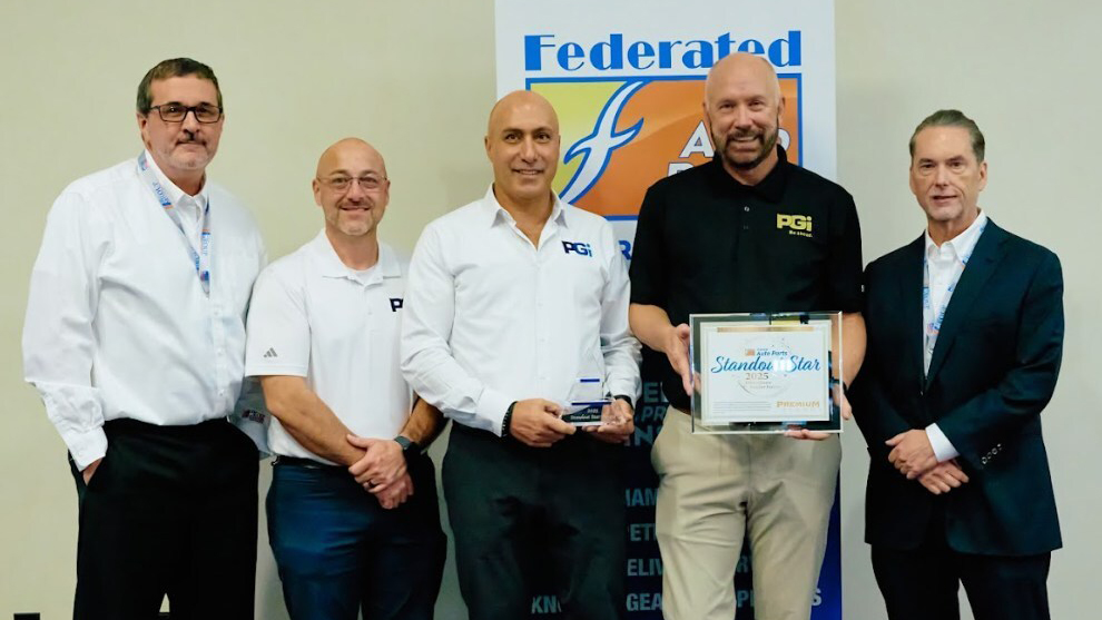 premium guard leadership team accepts fisher award